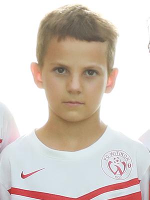 Maximilian T.